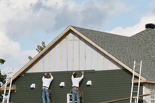 Professional Emergency Siding Repair technician working in Providence, KY
